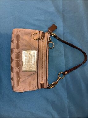 Coach Brown Signature Wristlet with Gold Plaque and Dark Brown Strap
